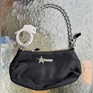 Heaven by Marc Jacobs handcuff bag